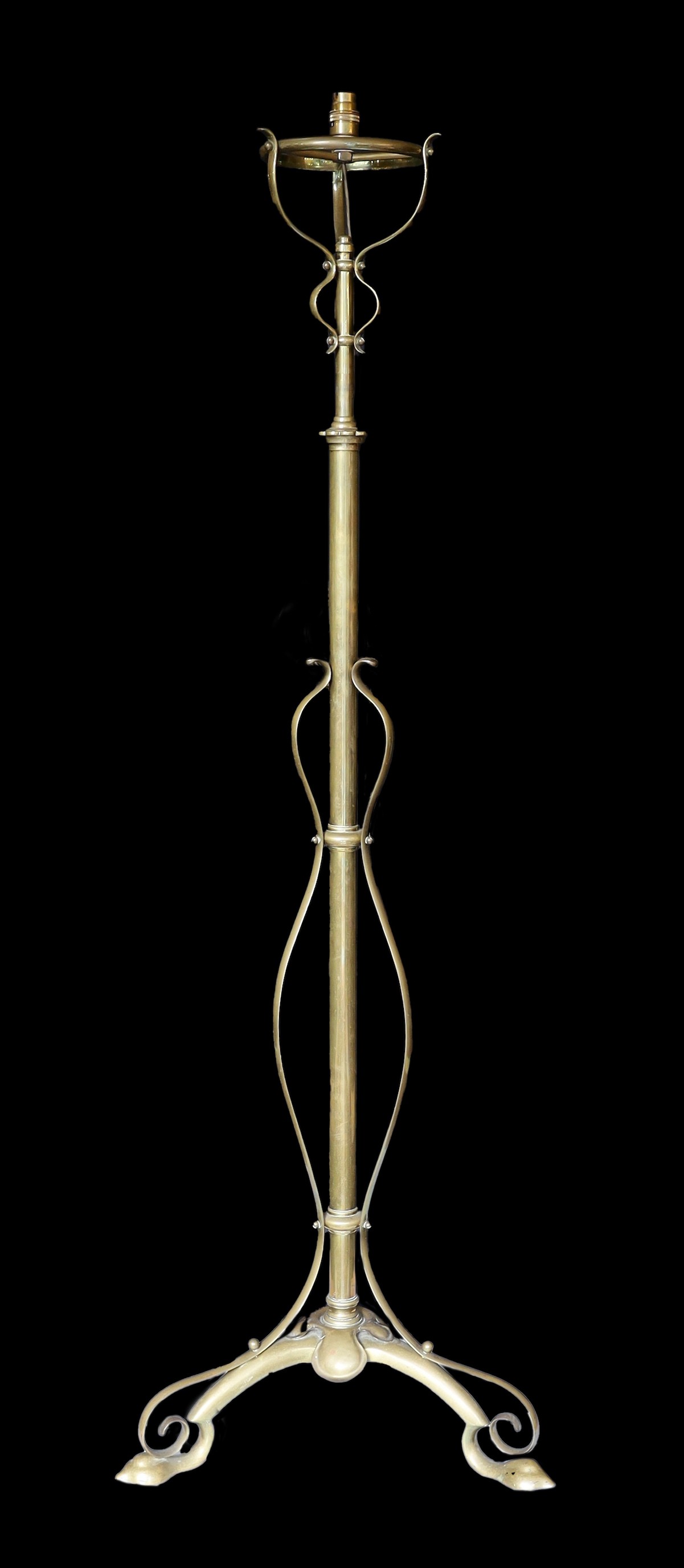 A late 19th century English telescopic lamp standard of Art Nouveau influence, converted from oil to electricity, heigh 149cm. width of base 49cm.
